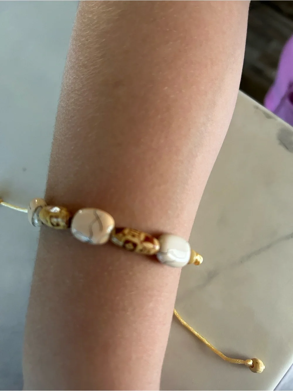 Adjustable White and Gold Bead Bracelet